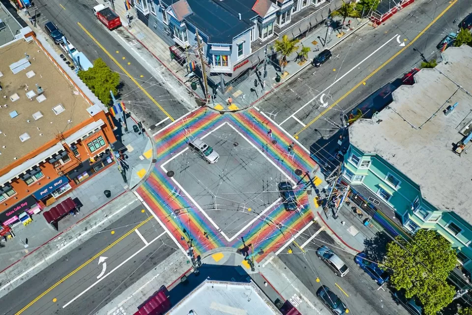 Aerial view of rainbow painted four-way crosswalk in the Castro district, San Francisco, California.